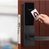 Bluetooth hotel smart card lock on a wooden door with tap‑to‑open access