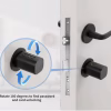 Installed smart cylinder demonstrating 180-degree rotation to access keypad and card reader