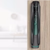 Smart lock installed on a wooden door with numeric keypad and integrated camera