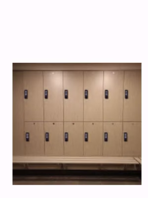 2026-SMARTEK-72_04 Electronic locker locks installed on wooden storage lockers in a changing room